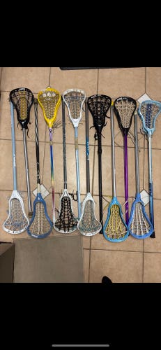 12 lacrosse sticks on hold for someone