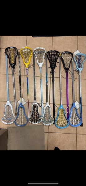 12 lacrosse sticks on hold for someone