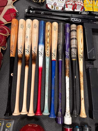 Bolus Of Baseball Bats & Trainers