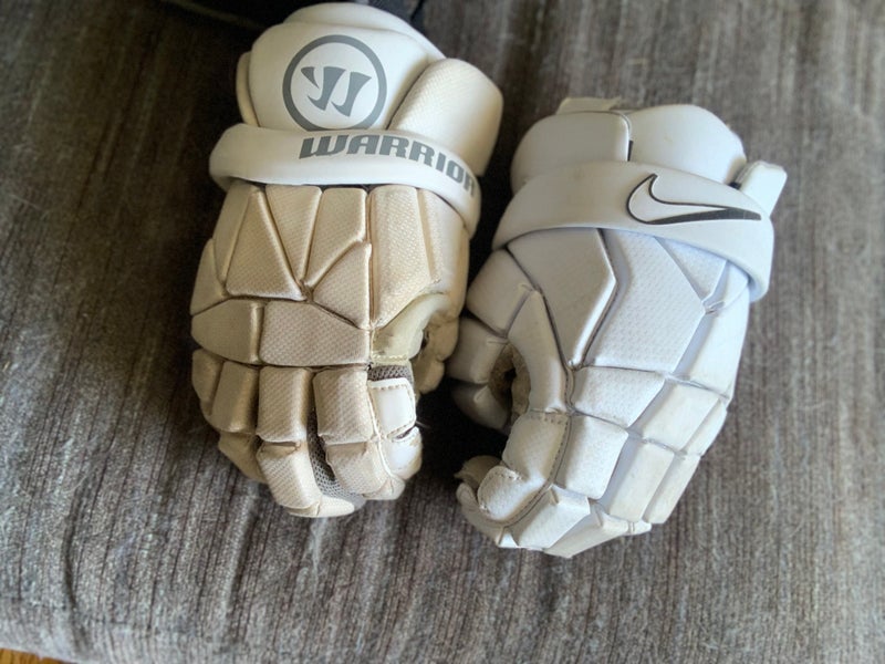 Warrior right and Nike Left Lacrosse Gloves Medium (Used)