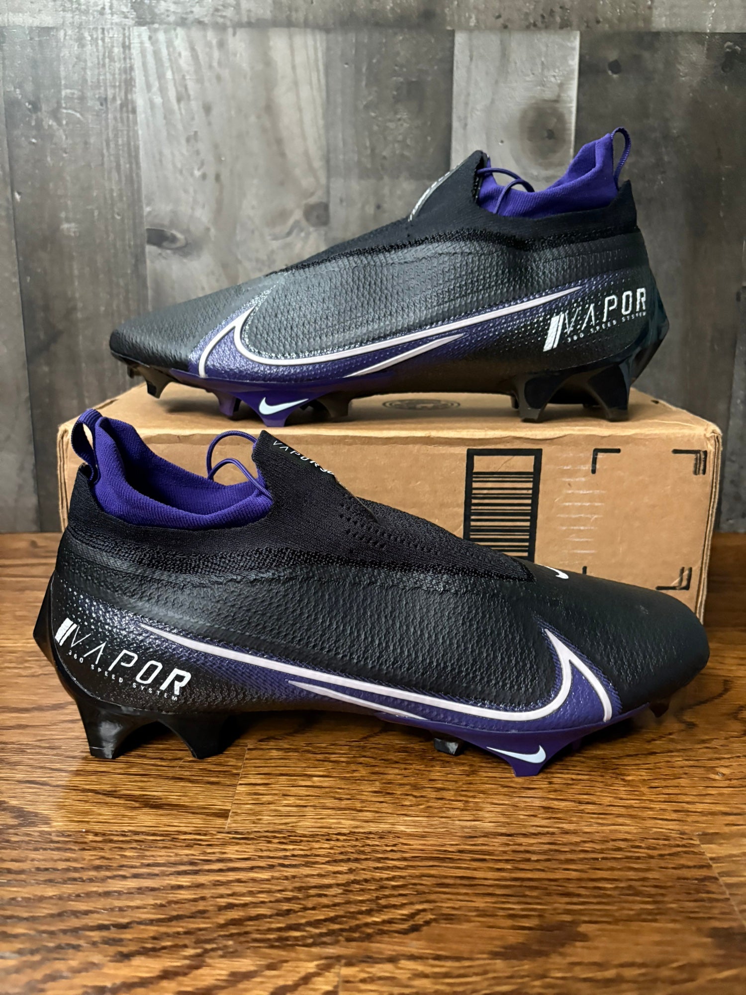 purple and black football cleats