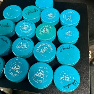 17 Blue Youth Hockey Pucks (4oz pucks)