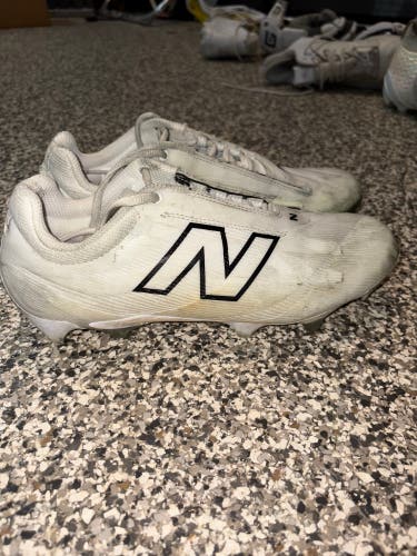 Size 10 M New Balance Burn X4 Cleats (used)