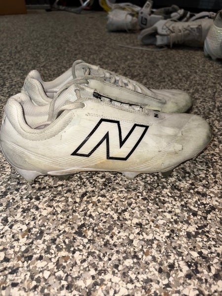 Size 10 M New Balance Burn X4 Cleats (used)