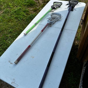 Three full lacrosse sticks! used