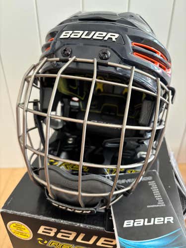 Small Bauer Re-Akt 100 Helmet (New) Navy and Orange with Cage