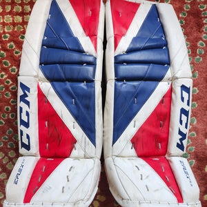 28" CCM Extreme Flex E5.5 Goalie Leg Pads Junior 28+1 Red & Blue (Used)