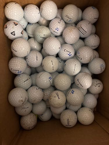 Lot of golf balls mostly Titliest