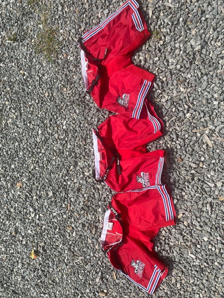 Red  Hartford Jr Wolfpack Small  and medium three  Pant Shells price of one.  (Used)