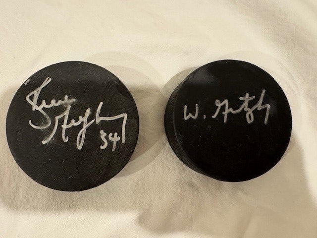 Brent Gretzky and Walter Gretzky Autographed Pucks – Rare Father and Son Collectible