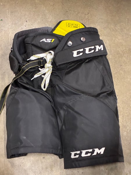 Black Junior Medium CCM AS1 Hockey Pants (Used)