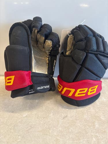 Used Bauer ELITE GRYPHONS Junior Gloves Black 11" 11858-S000078297