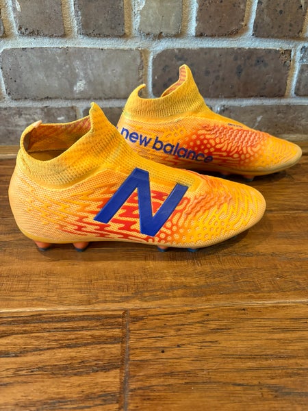 Orange Men's Size M 7.0 (W 8.0) Adult New Balance Molded Cleats Cleats (Used)
