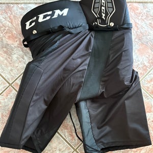 Black Large CCM hockey padded shorts