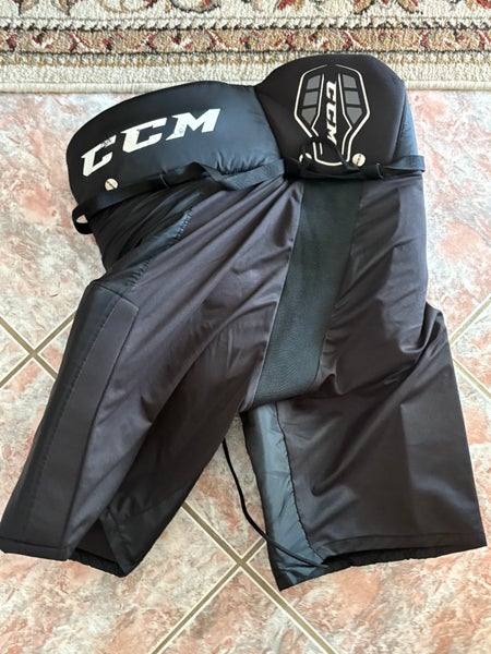 Black Large CCM hockey padded shorts
