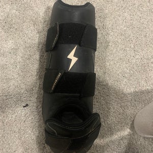 Black Bruce bolt leg guard