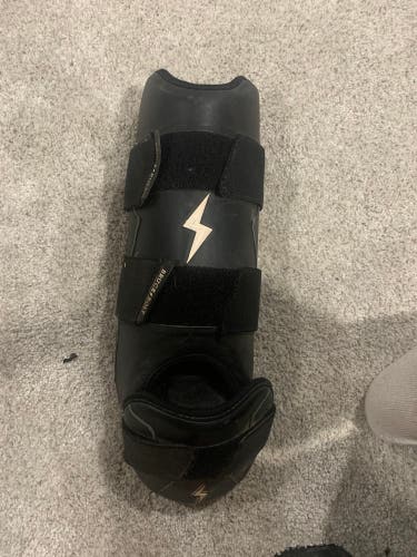 Black Bruce bolt leg guard
