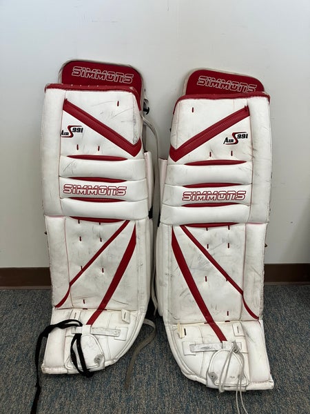 White 32" Senior Simmons Goalie Leg Pads (Used)