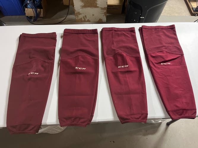 4 Pairs Of Burgundy Large Adult CCM Skate Socks (Used)