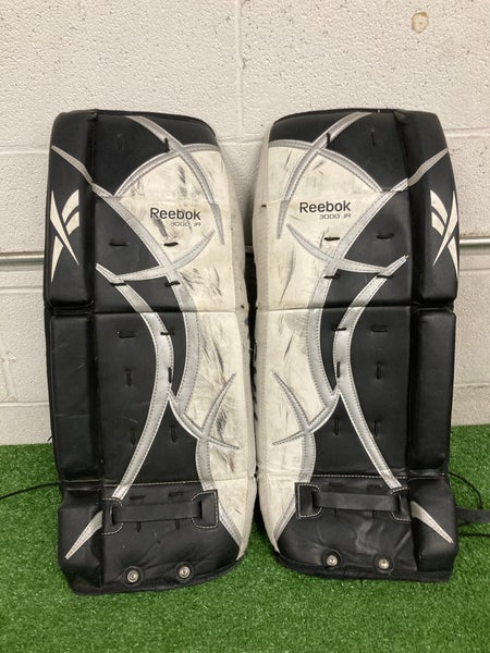 Black 24" Youth Reebok Goalie Leg Pads (Used)