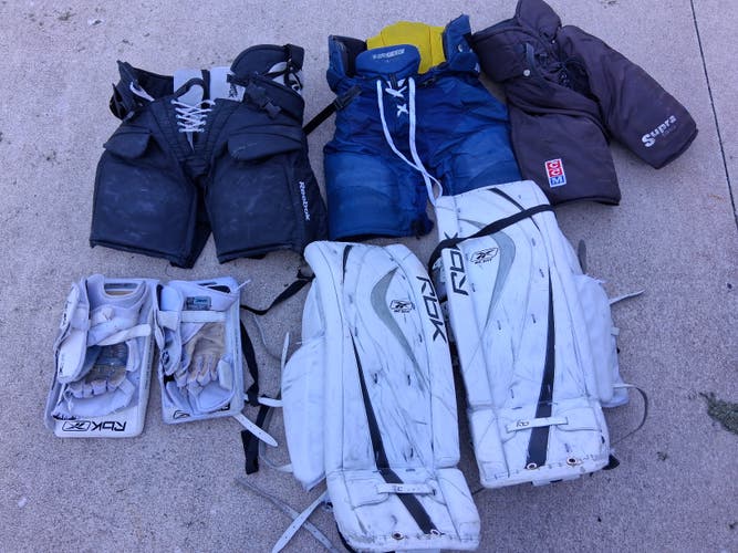 Hockey goalie and player gear bundle of 7 used retro items