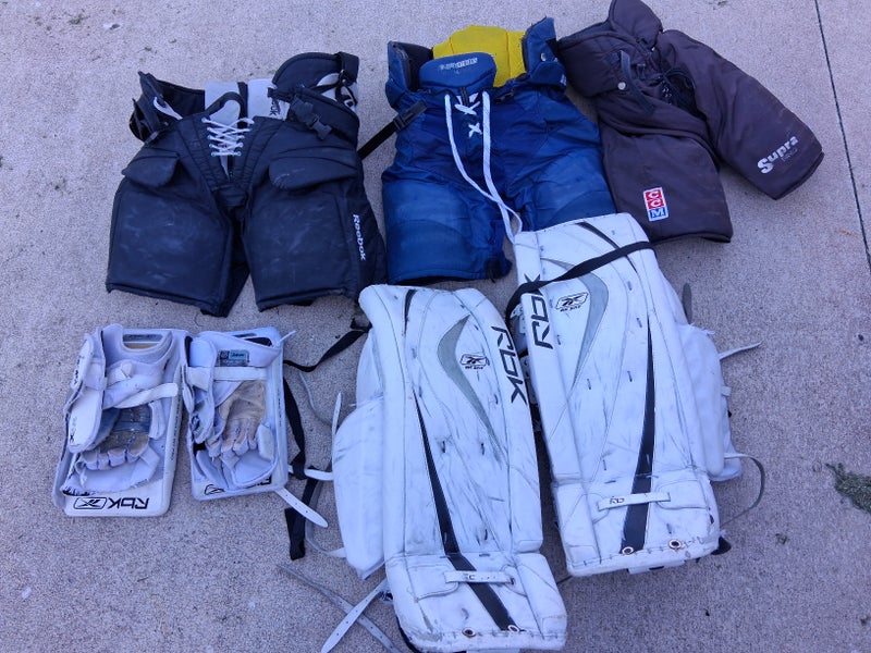 Hockey goalie and player gear bundle of 7 used retro items