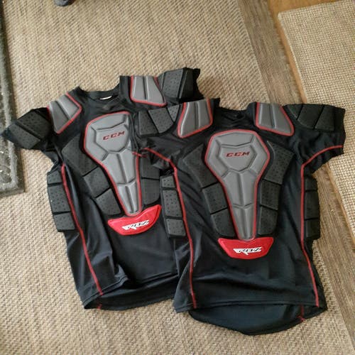 2 CCM RBZ Padded Shirts