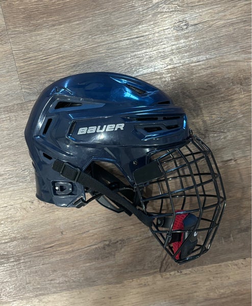 Medium Bauer Re-Akt 155 Hockey Helmet with CCM Cage
