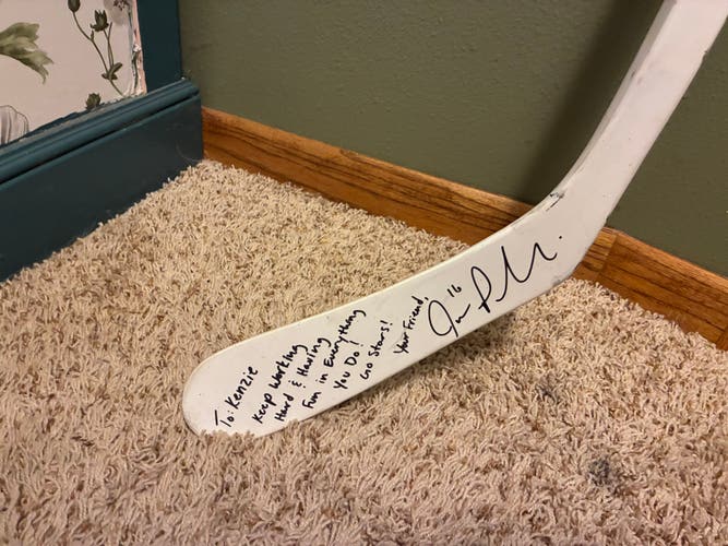 Signed Joe Pavelski stick and puck