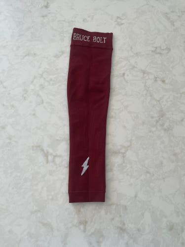 Maroon Bruce bolt compression arm sleeve.