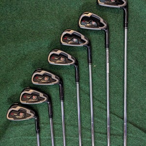 Wilson Staff C100 4-P irons with original grips and Reg flex CL100 Steel shafts