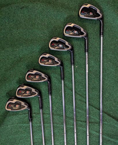 Wilson Staff C100 4-P irons with original grips and Reg flex CL100 Steel shafts