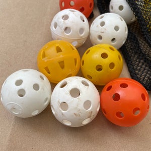 70 Wiffle style golf ball sized hand / eye coordination hitting practice balls