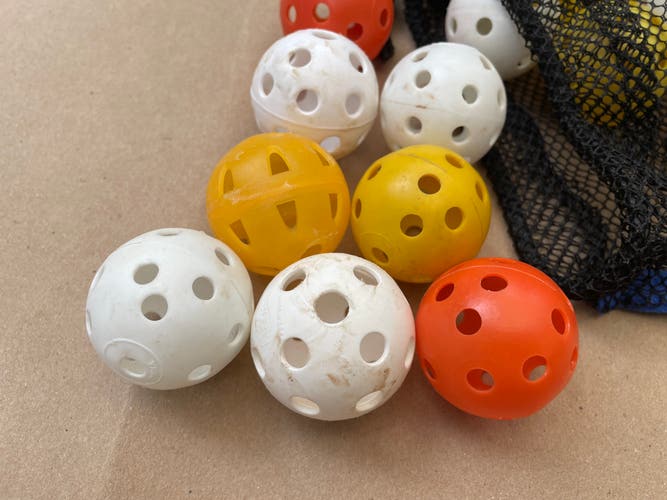 70 Wiffle style golf ball sized hand / eye coordination hitting practice balls