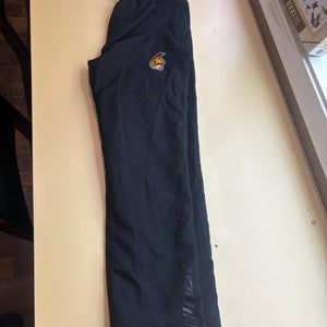 Bauer (Used) seacoast Spartans ice hockey warm-up pants nylon sweatpants.  Size youth, extra large.