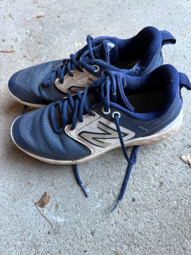 New Balance molded cleats big kid size 5