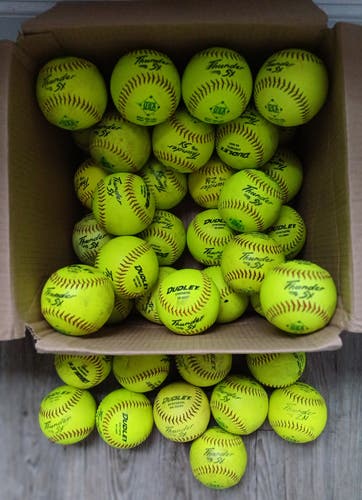 40 used softballs. All 12' Dudley Thunderheat
