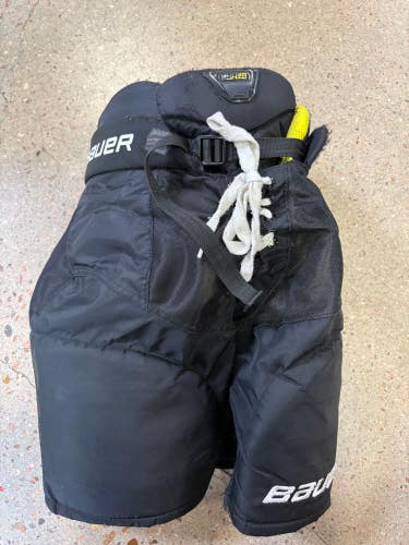 Black Youth Large Bauer Supreme Ultrasonic Hockey Pants (Used)