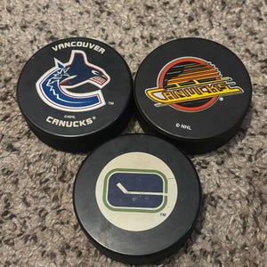 Vancouver Canucks NHL Vintage Hockey Pucks