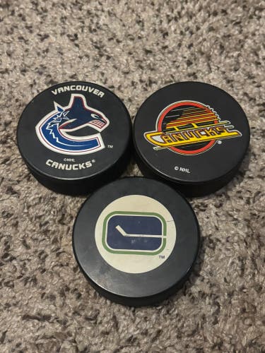 Vancouver Canucks NHL Vintage Hockey Pucks