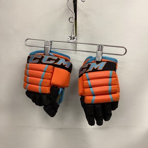 Used CCM HG4PC Youth Gloves Black And Orange 10" 11851-S000037767