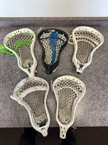 Multiple Used Lacrosse heads all strung