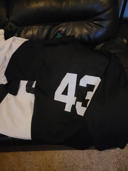 Matching set of black/white jerseys