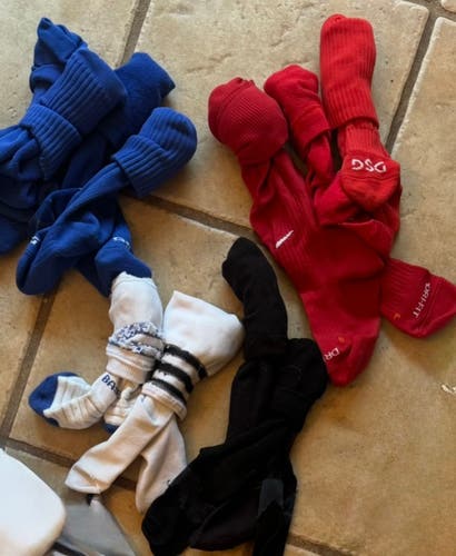 New to slightly used sports socks, knee high