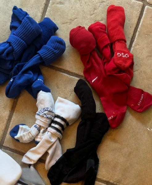 New to slightly used sports socks, knee high