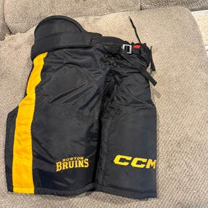 Bruins black and yellow Men's Senior Medium CCM HP45 Hockey Pants Pro Stock (Used)