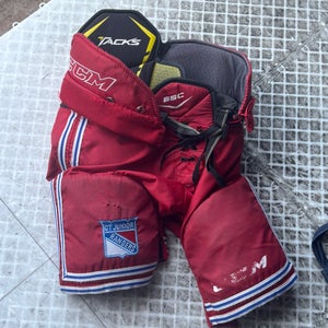 Junior Large CCM Tacks 65c Connecticut Junior Rangers Hockey Pants (Used)