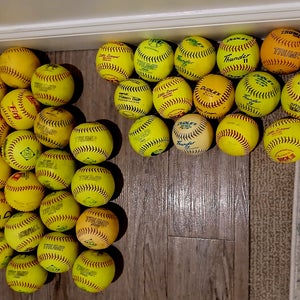 40 softballs, 25 are 12', 15 are smaller. See pics