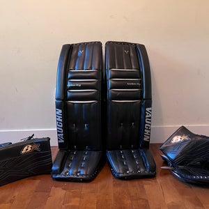 35 + 2" Vaughn v5 pads, modern velcro strapping, Brian's gloves in great shape all black