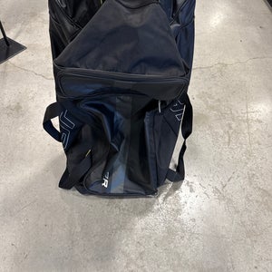Black Bauer Wheeled Equipment Bag (Used) | 34”x 20”x 12”